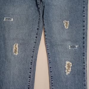 DG2 Stretch Jeans with rips filled with gold rhinestones